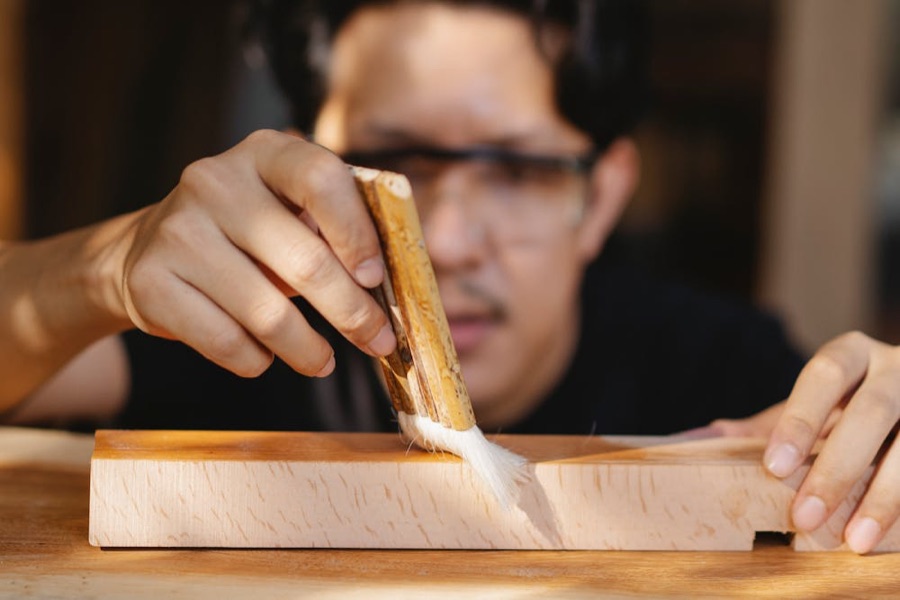 Craftsman planing wood