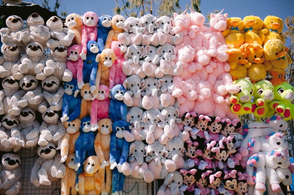 Colorful plush toys at a market stall